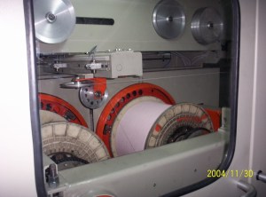 auto double take up travers system